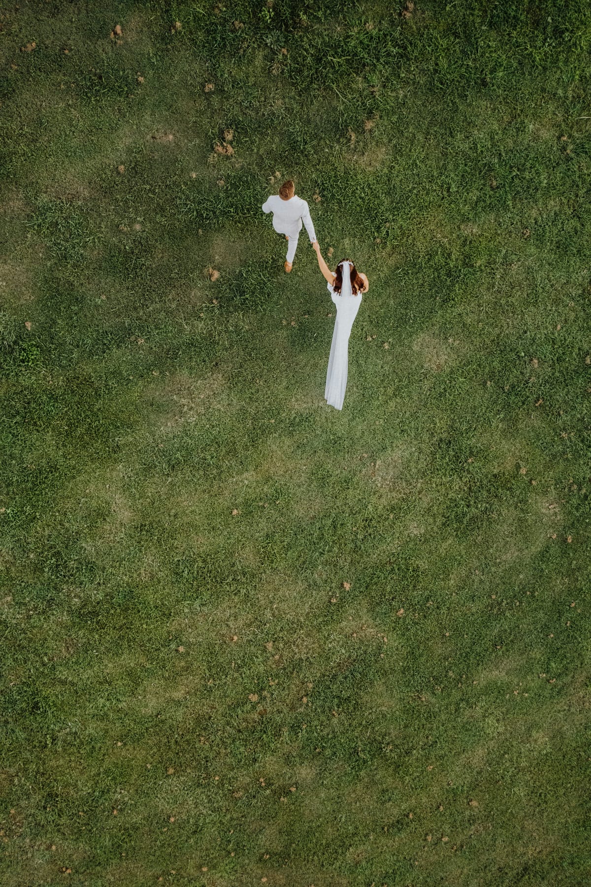 A wedding bouquet resting on the grass